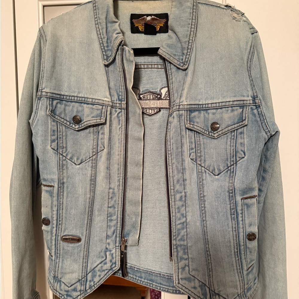 Harley-Davidson Light Blue Denim Jacket with Harley patch on the back.
